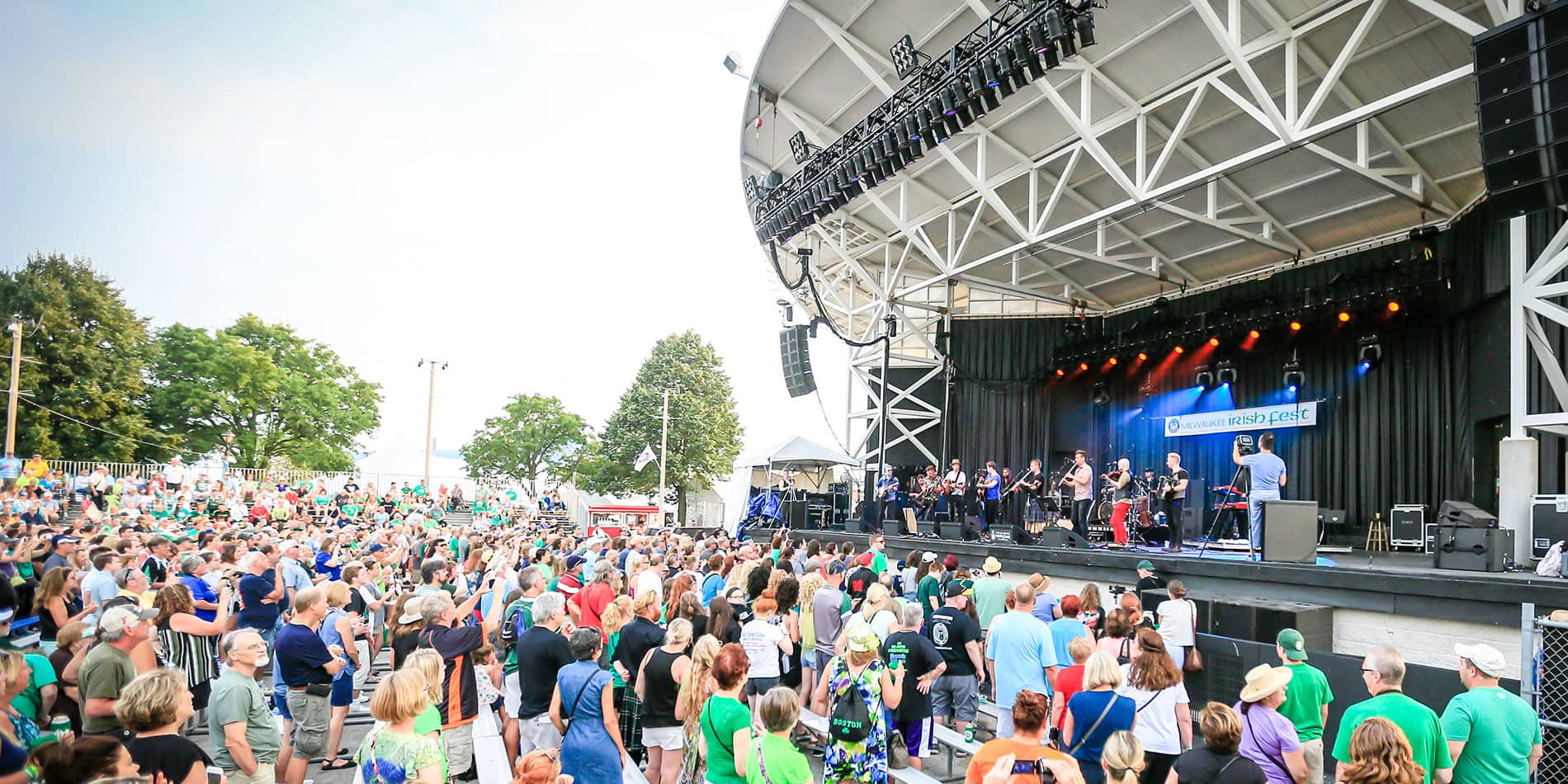Milwaukee Irish Fest crowd at a concert stage.