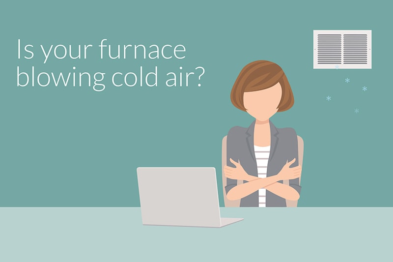 Why Is My Furnace Blowing Cold Air? Woman shivering under cool air blowing out of vent.